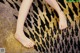 A woman's bare feet on a leopard print rug.